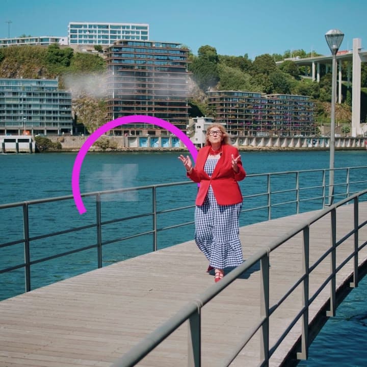 Ana Baptista on the Douro bridge with Vila Nova de Gaia in the background